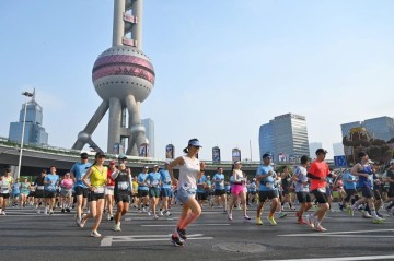 世界杯直播平台官网手机版下载-十年能打磨出一场怎样的大众赛事？上海半马即将鸣枪给出答案